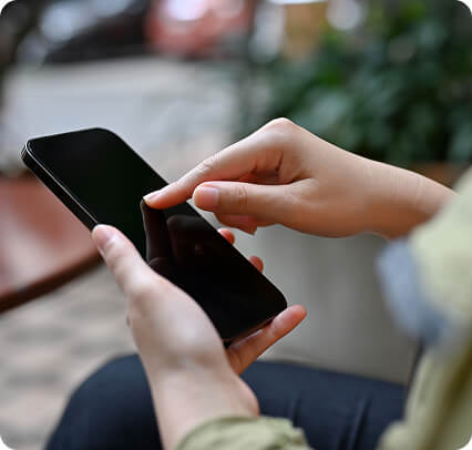 Up close view of a person using a smart phone